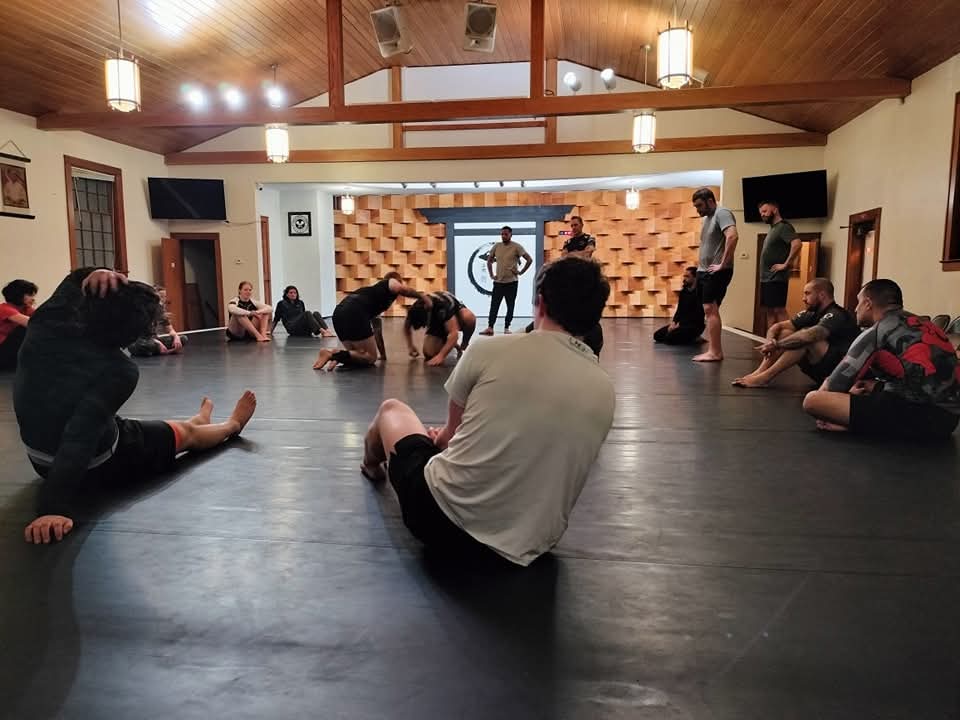 Adults training jiu-jitsu at Great Lakes BJJ in Flint, MI
